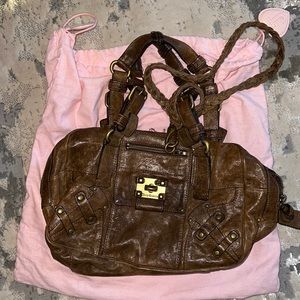 Barely worn leather juicy couture handbag. With dust bag!